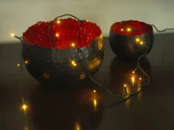 Konstsmide Micro LED Lichterkette 100 bernsteinfarbene LEDs grünes Kabel innen